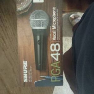 15" speaker with small mixer microphone stands and